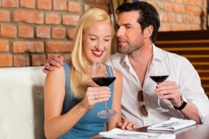 man-and-woman-date-drinking-wine-restaurant
